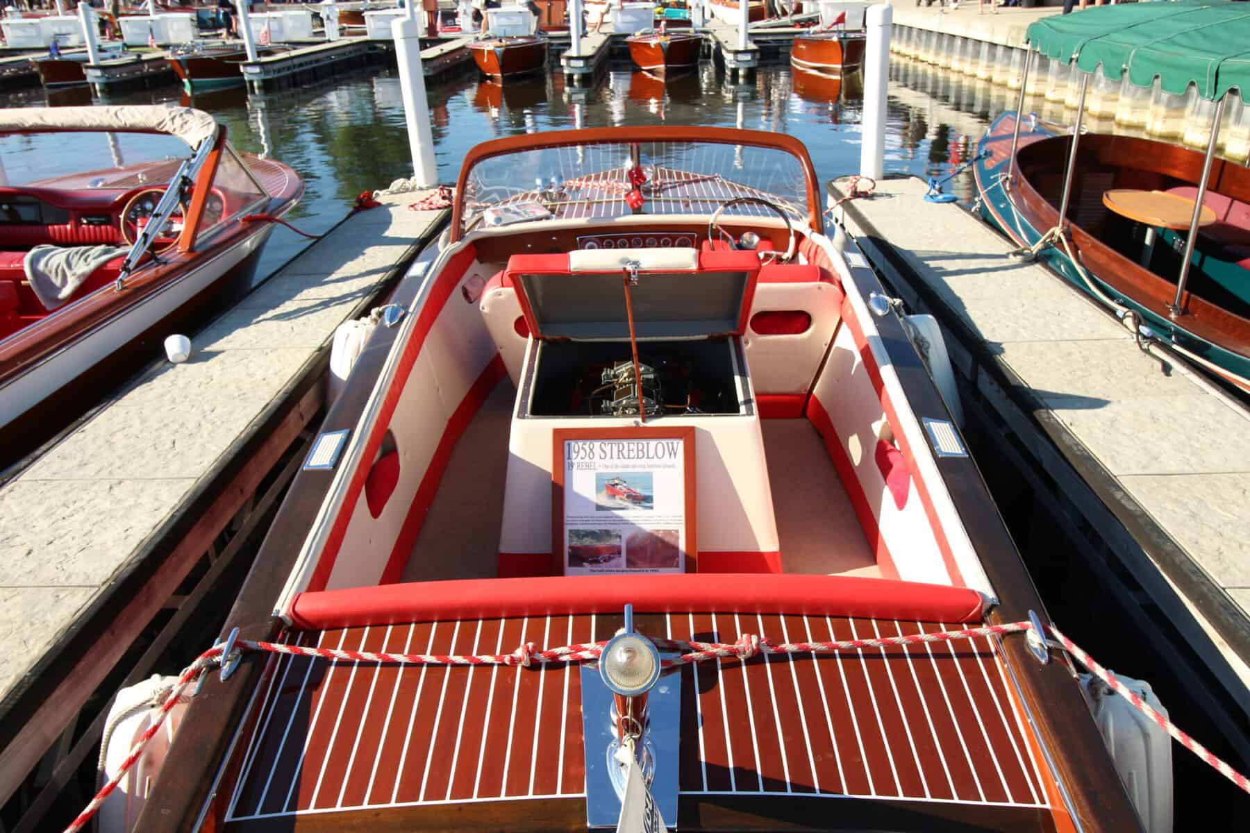 Vintage speedboat docked at Lake Geneva marina for boat show.