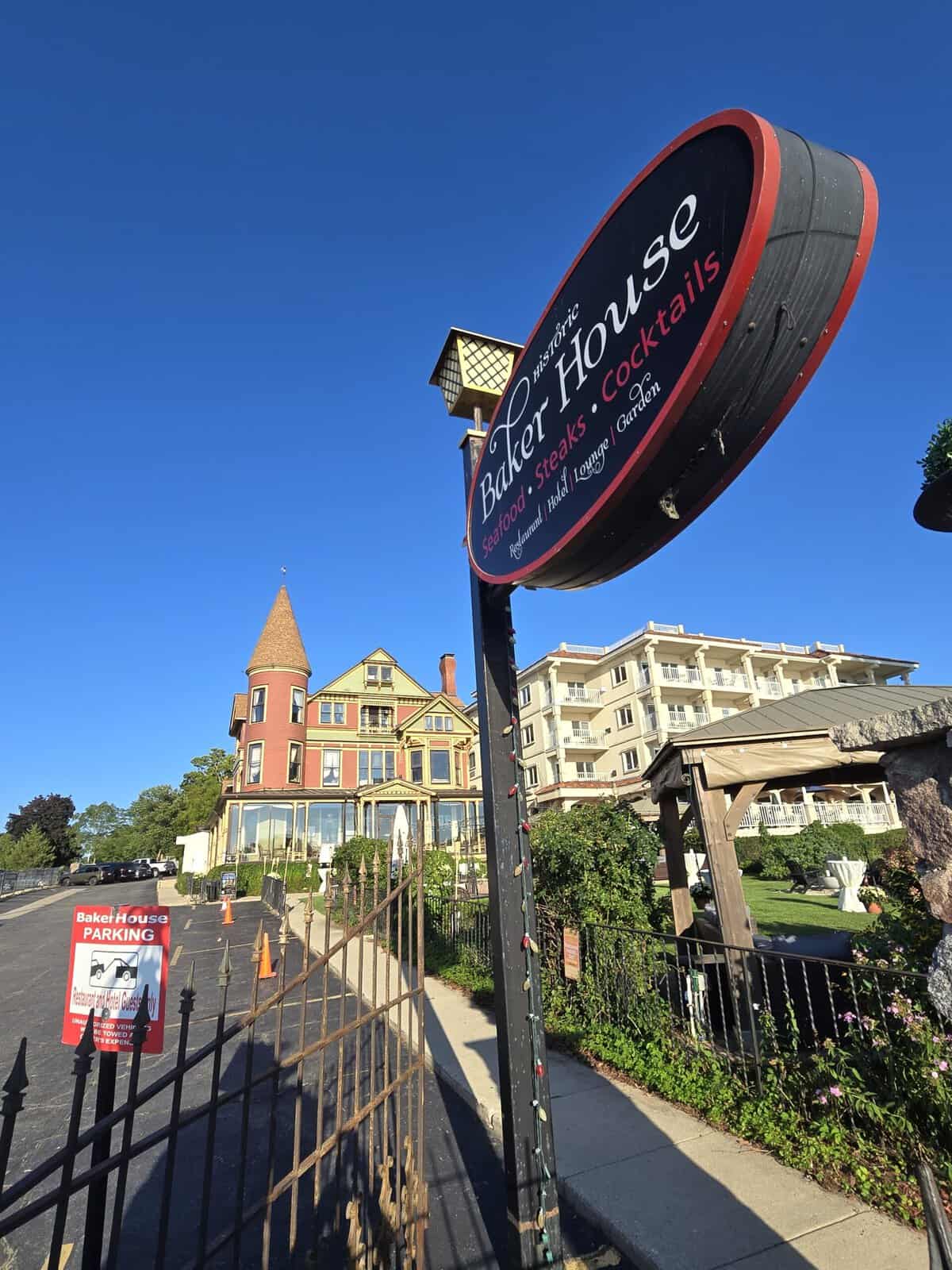 The Historic Baker House sign and 1885 Victorian on Wrigley Drive