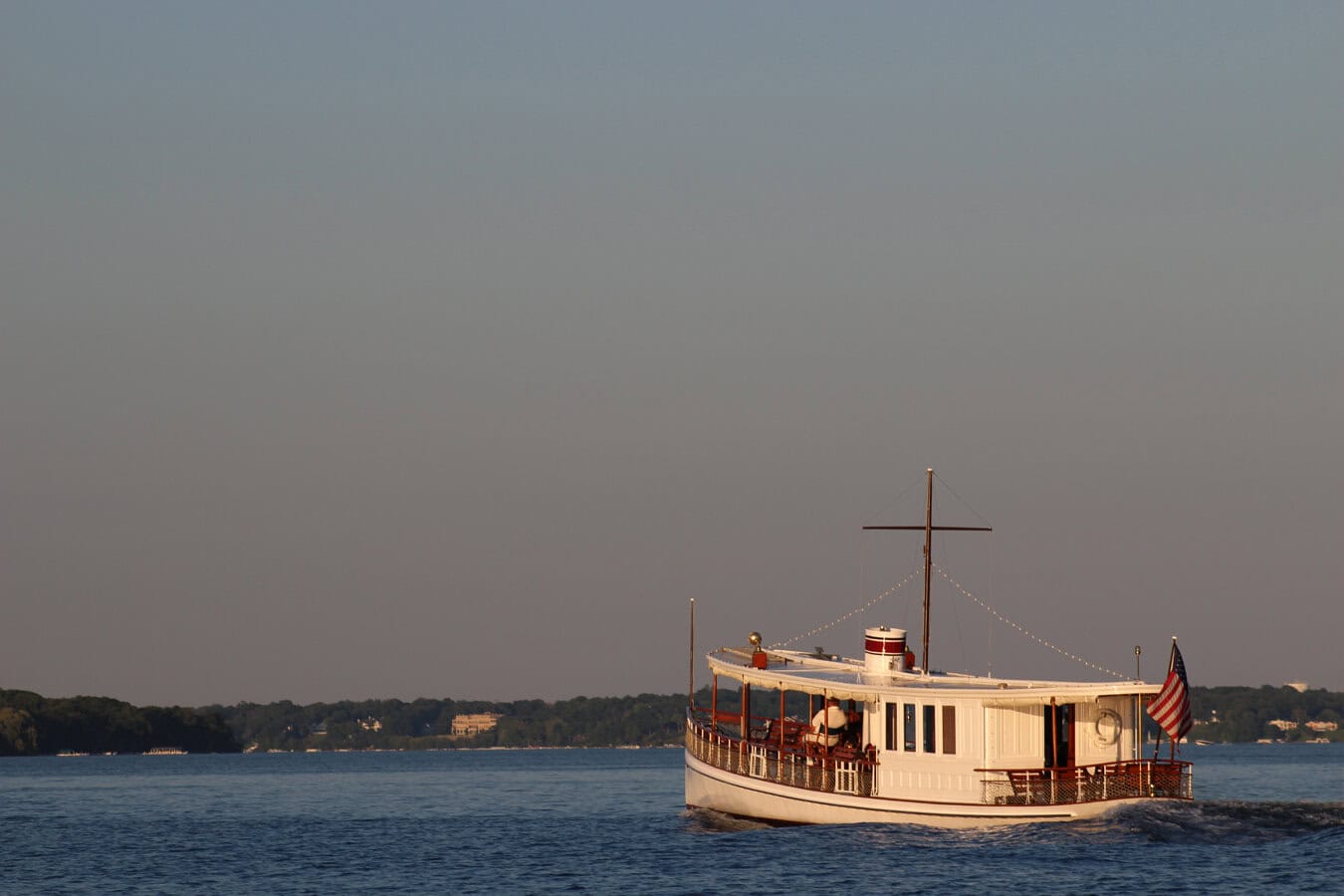 Boat on Geneva Lake at golden hour