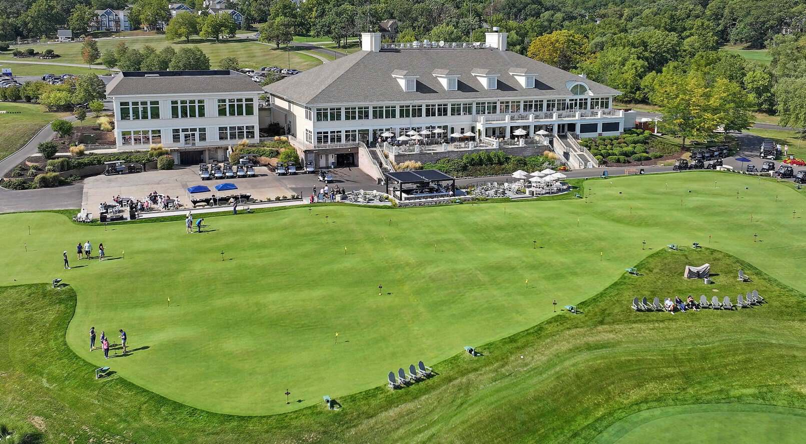Geneva National clubhouse patios above the Dance Floor putting course