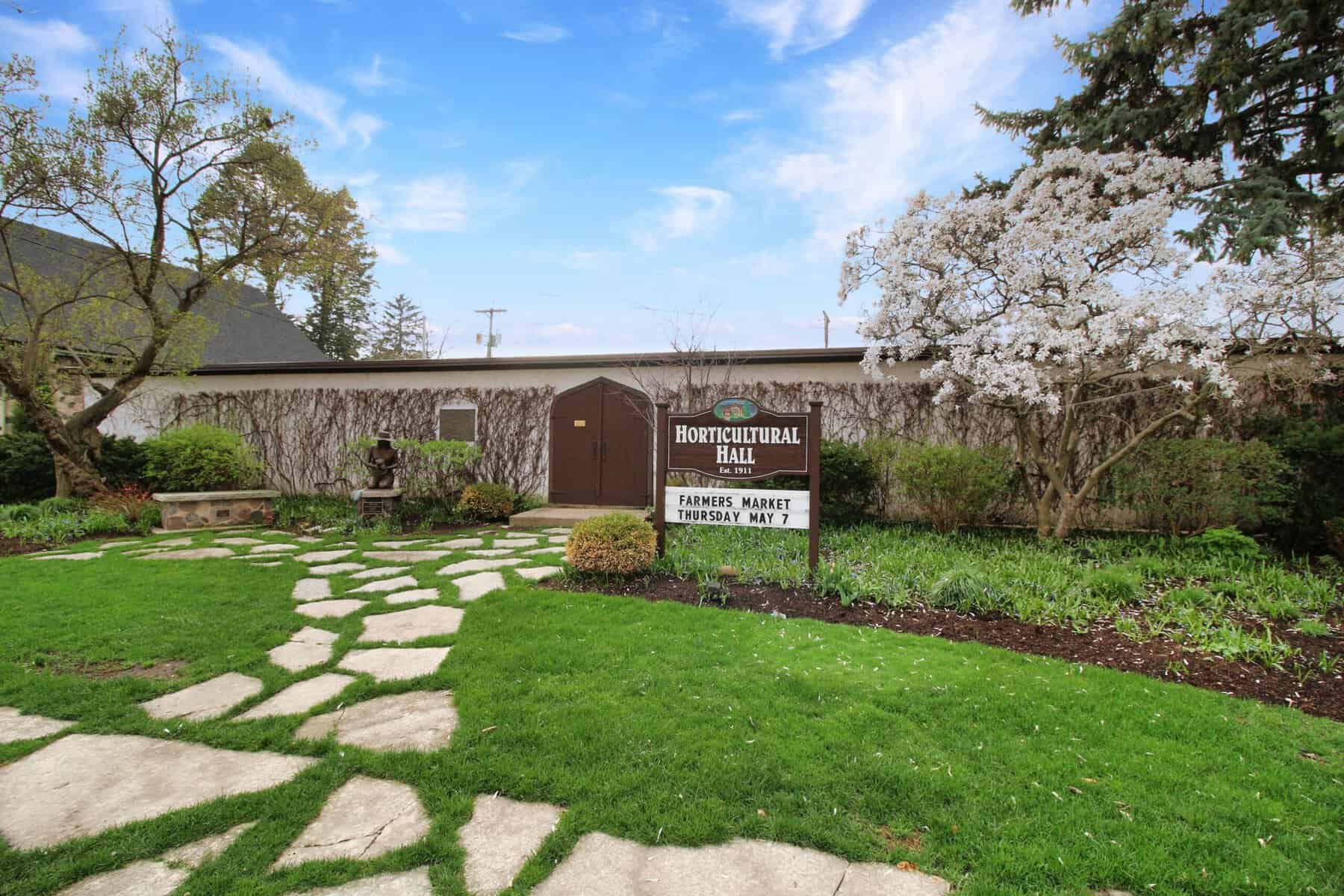 Horticultural Hall, built 1911, with its farmers market sign