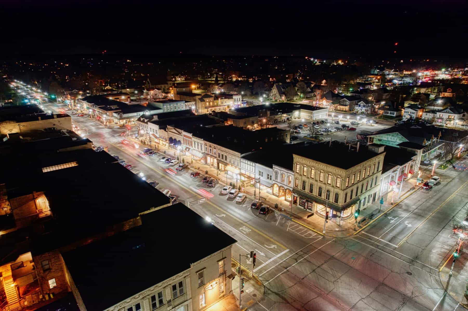 Aerial of downtown Lake Geneva's Main Street lit up at night